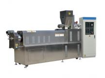 Extrudeuse à double vis pour la production de machine à grignoter feuilletée