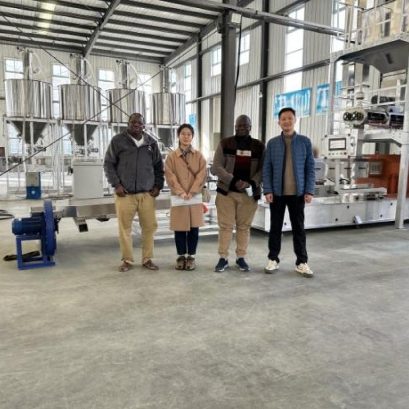 Photo with customer in factory
